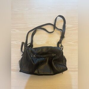 The SAK Black Luxury Pebbled Leather Tassels Crossbody Purse Handbag